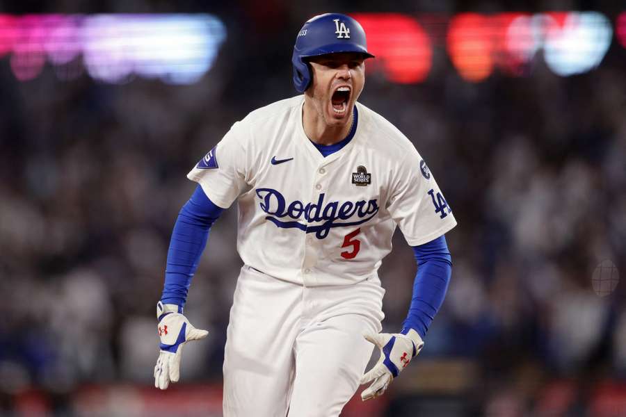 Freddie Freeman of the Los Angeles Dodgers celebrates after hitting a walk-off grand slam against the New York Yankees