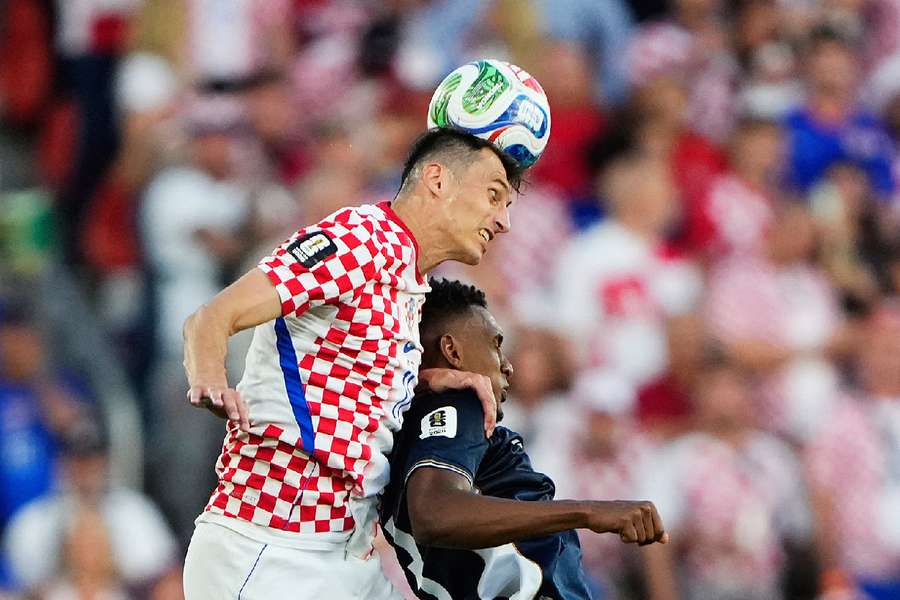 Croatia's Ante Budimir in action with Panama's Jiovany Ramos Croatia's Ante Budimir in action with Panama's Jiovany Ramos