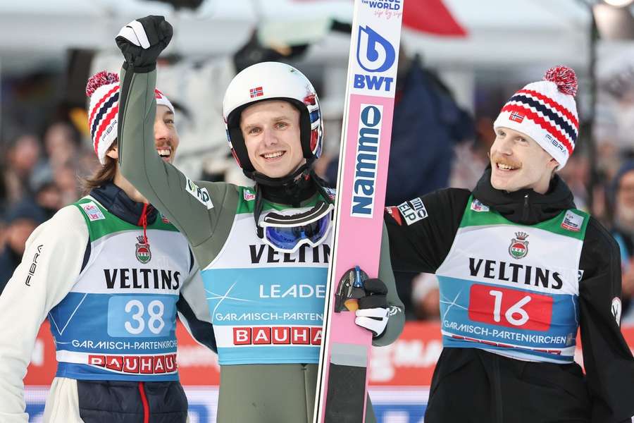 Halvor Egner Granerud (c) celebrates with teammates Robert Johansson (r) and Johann Andre Forfang