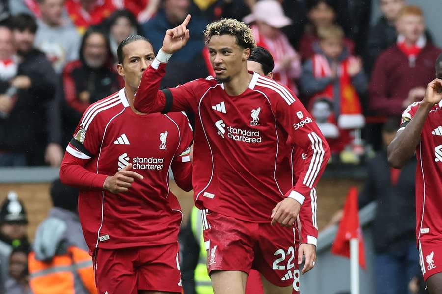 Liverpool's French striker #22 Hugo Ekitike (C) celebrates after scoring their second goal