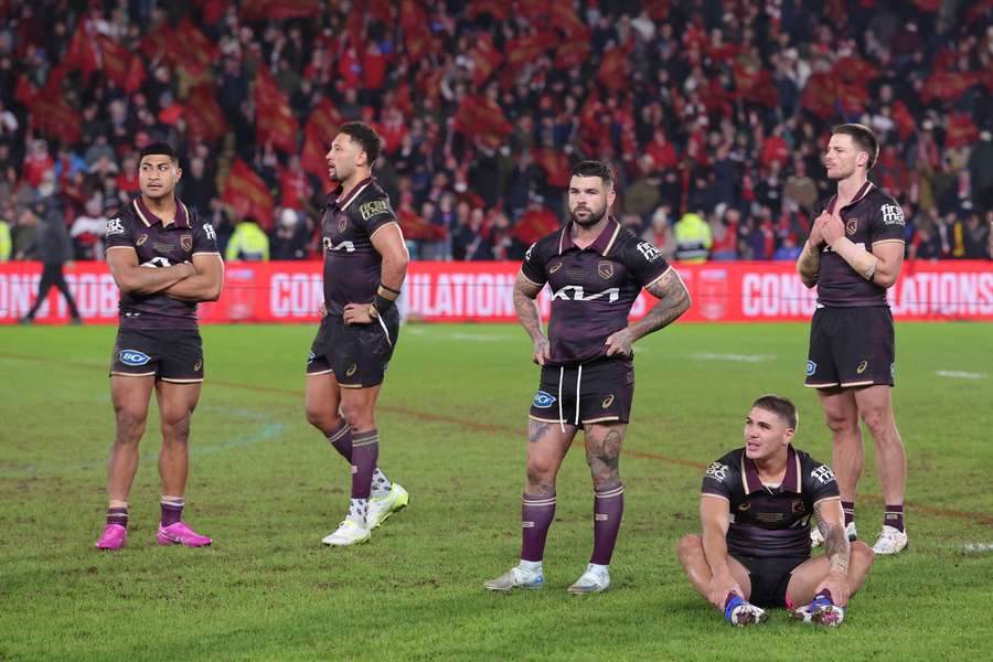 Dejected Brisbane Broncos players reflect on what might have been in Hull. Dejected Brisbane Broncos players reflect on what might have been in Hull.