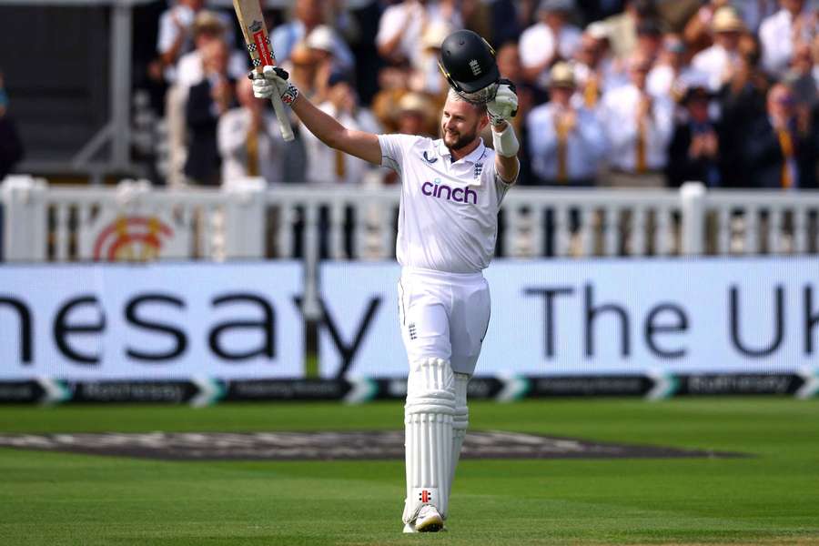 England's Gus Atkinson celebrates after reaching his century