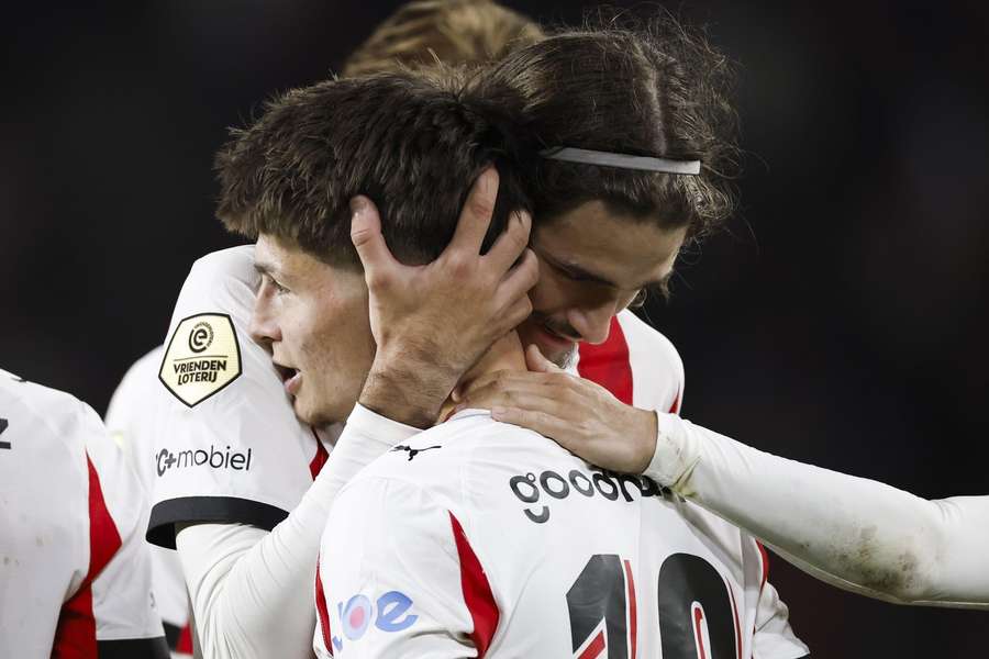 PSV's Yarek Gasiorowski embraces Esmir Bajraktarevic after the latter scored the 4-1 against PEC Zwolle