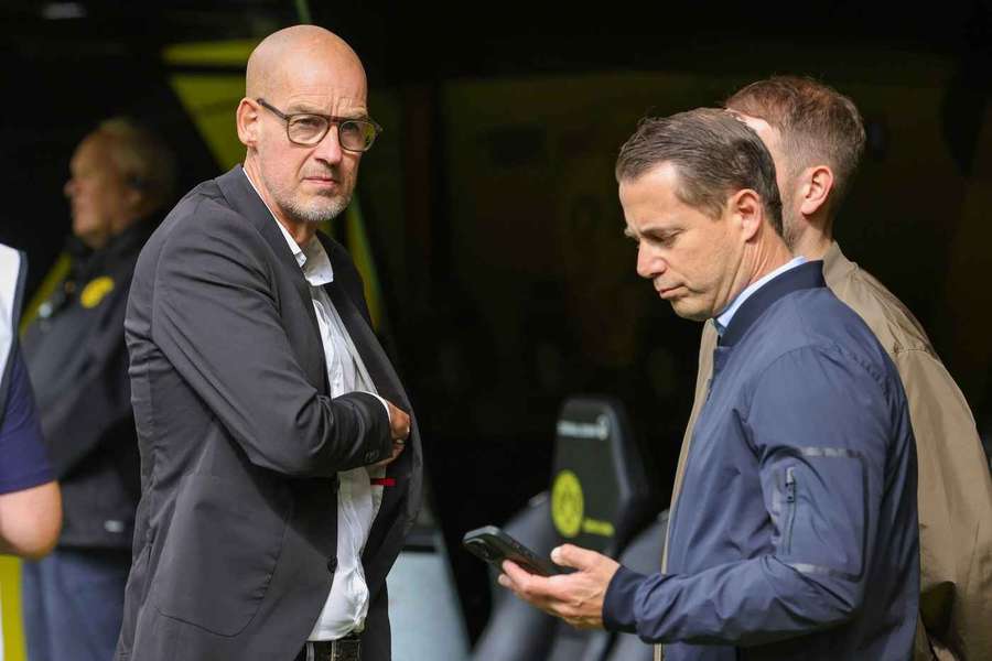 Carsten Cramer (l.) und Lars Ricken bleiben Borussia Dortmund länger erhalten.