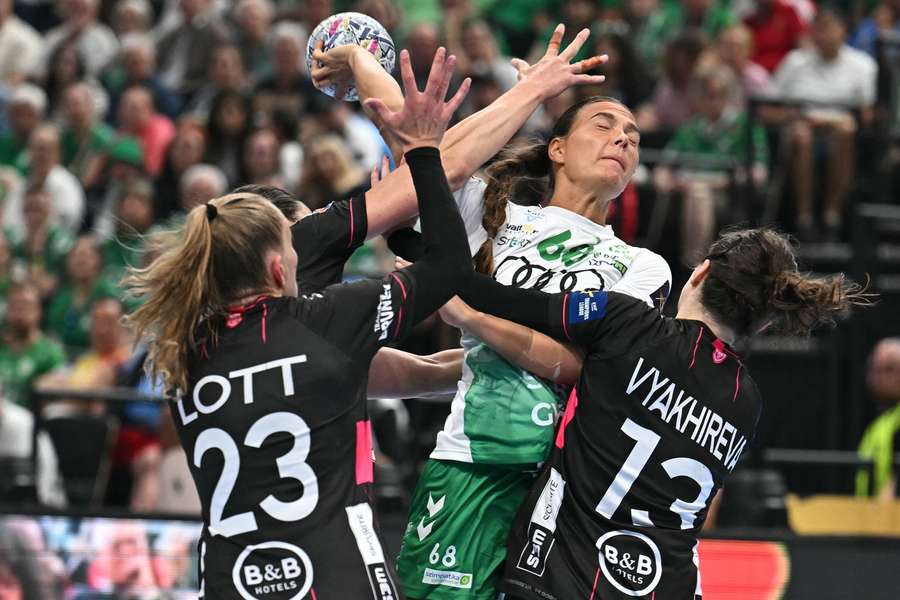 Brest's German left back Annika Lott and Russian right back Anna Vyakhireva tries to cover the threat of Helena Elver Brest's German left back Annika Lott and Russian right back Anna Vyakhireva tries to cover the threat of Helena Elver