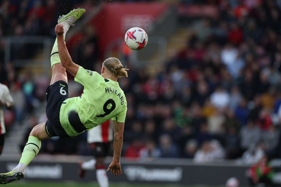 Manchester City's Norwegian striker Erling Haaland scores their third goal with this overhead kick during the English Premier League football match between Southampton and Manchester City