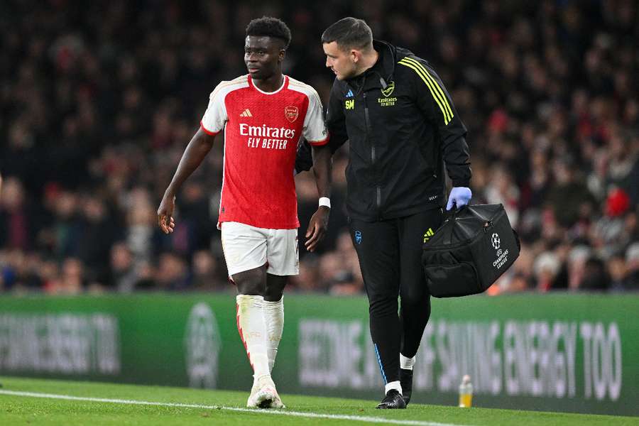 Bukayo Saka of Arsenal reacts as he is substituted against Sevilla