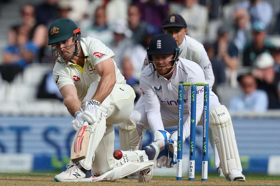 Marsh sweeps a ball from England's Moeen Ali to the boundary on day five of the fifth Ashes cricket Test