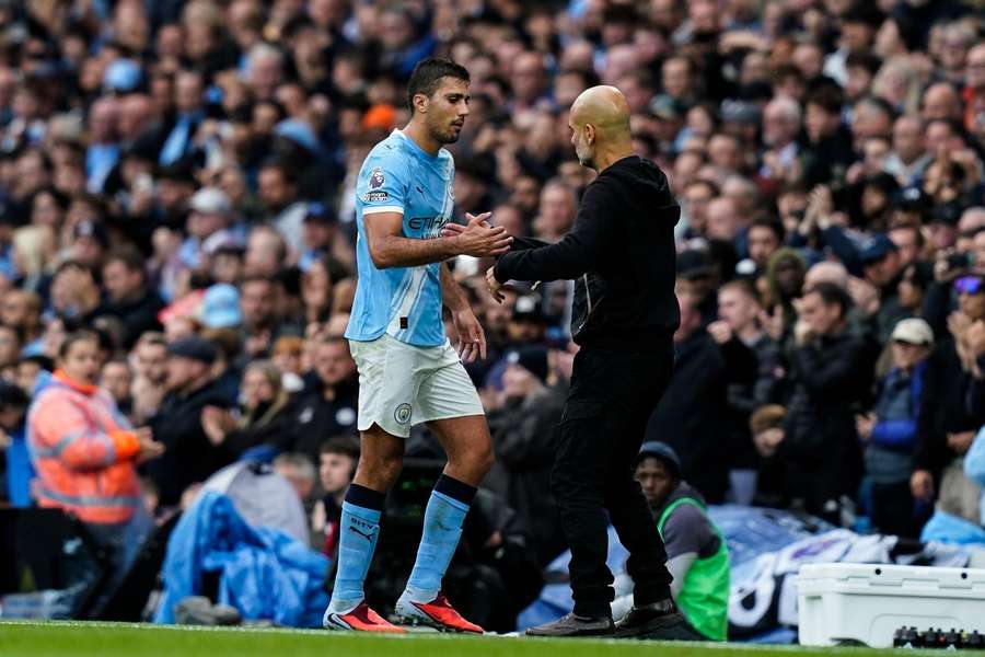 Pep Guardiola, alături de Rodri