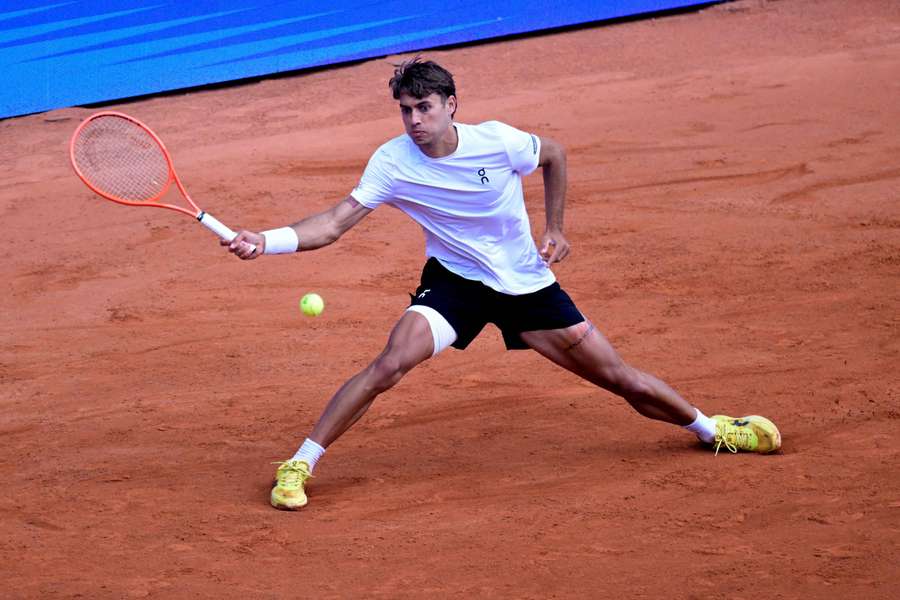 Italy's Flavio Cobolli in action during his semi-final match against Argentina's Tomas Martin Etcheverry in Hamburg