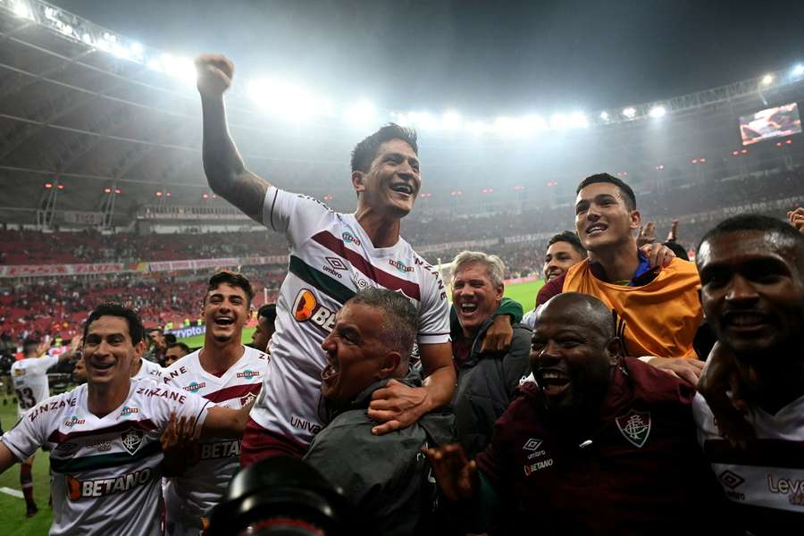 Fluminense's players celebrate their dramatic win