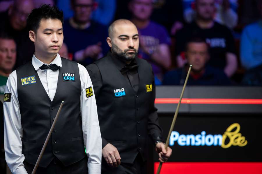 Si Jiahui și Hossein Vafaei