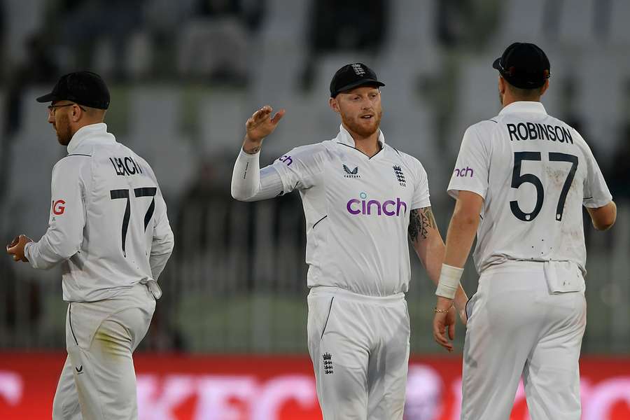 Ben Stokes (C) celebrates with his fellow cricketers