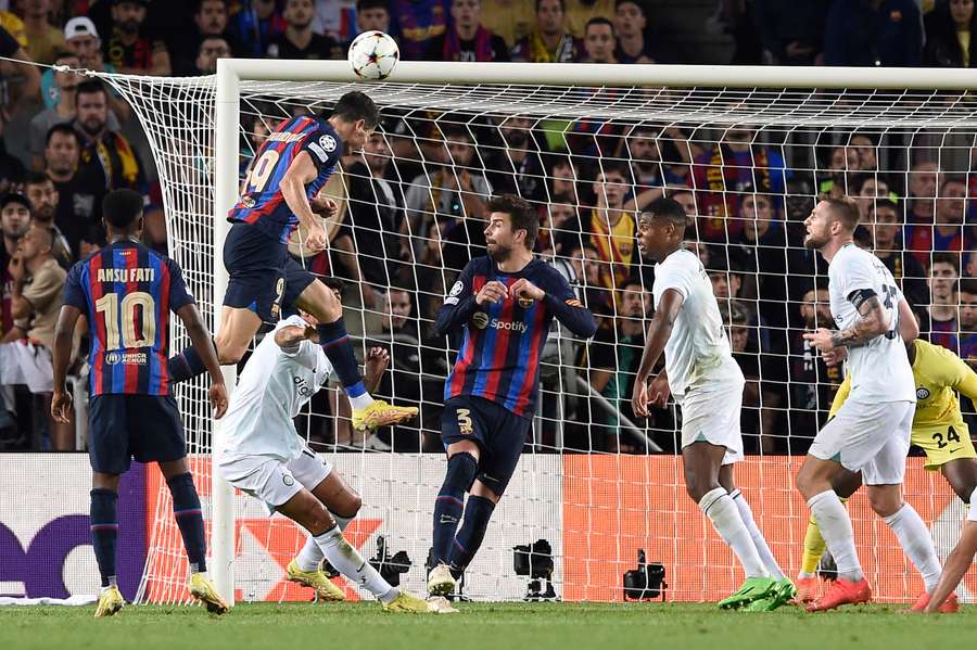 Barcelona's Polish forward Robert Lewandowski scores his team's third goal