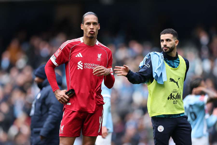 A dejected Virgil van Dijk looks on after the final whistle at the Etihad A dejected Virgil van Dijk looks on after the final whistle at the Etihad