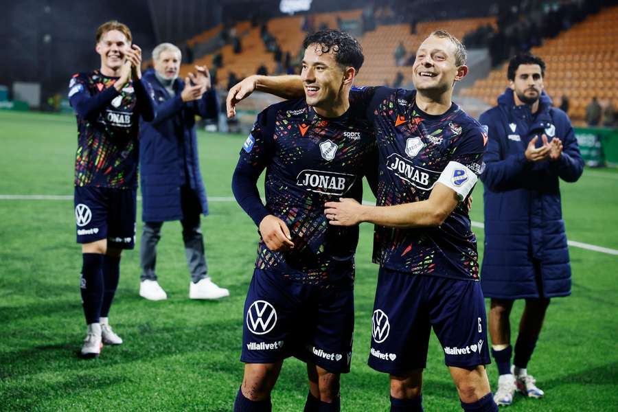 Hussein Carneil and Joel Allansson celebrate HBK's win at full-time