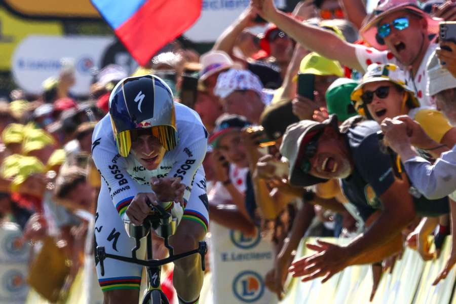 Remco Evenepoel in action at the end of stage 16 individual time trial during the Tour de France Remco Evenepoel in action at the end of stage 16 individual time trial during the Tour de France