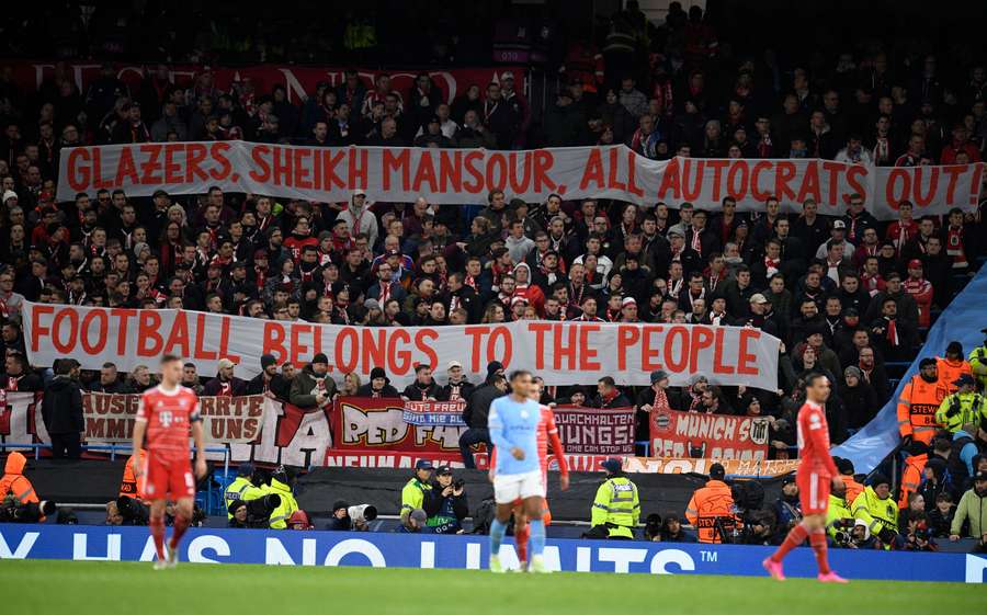 Bayern fans display banners against 'all autocrats' owners during the UEFA Champions League quarter final match against Man City