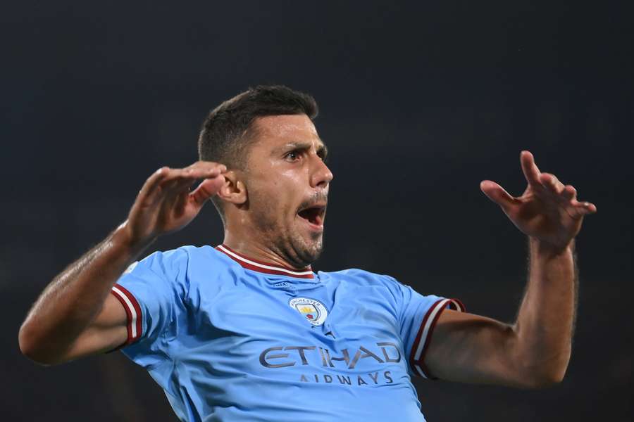 Rodri celebrates as Man City go 1-0 up