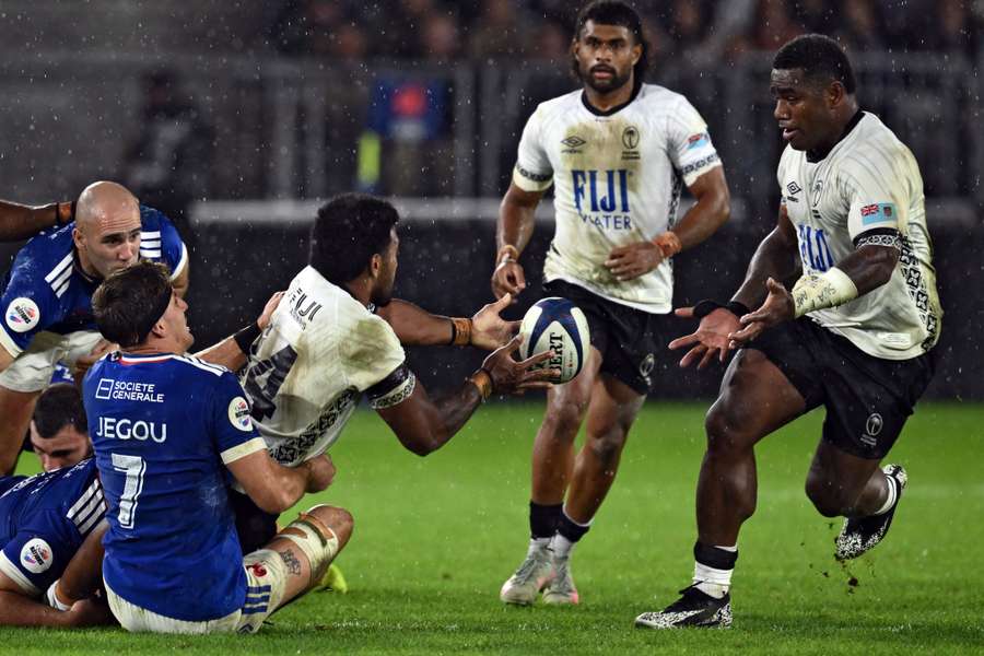 Selestino Ravutaumada passes the ball to Josua Tuisova in a game against France last November.