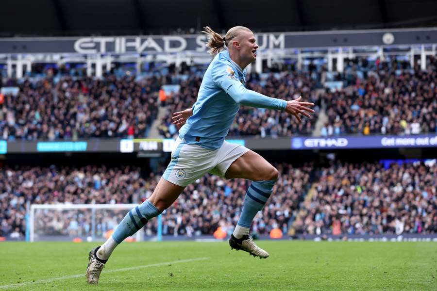 Erling Haaland of Manchester City celebrates scoring his team's first goal