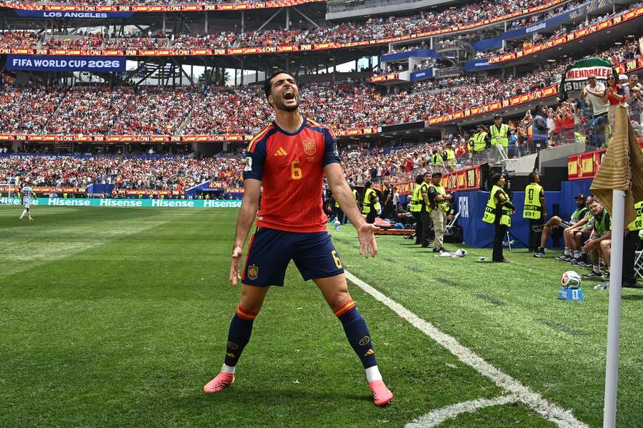 Mikel Merino celebrates his winning goal for Spain. Mikel Merino celebrates his winning goal for Spain.