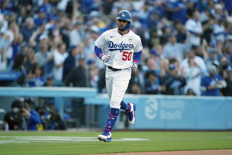 Betts rounds the bases after hitting a home run in the first inning