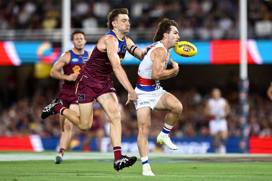 Harris Andrews pursues Western Bulldogs forward Rhylee West on Saturday.