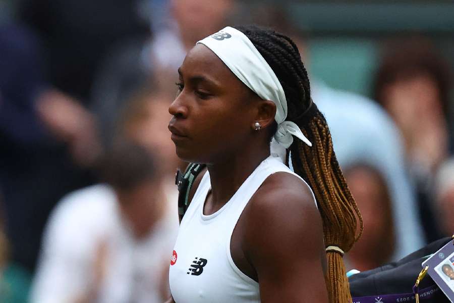 Coco Gauff looks dejected after her first-round match against Sofia Kenin