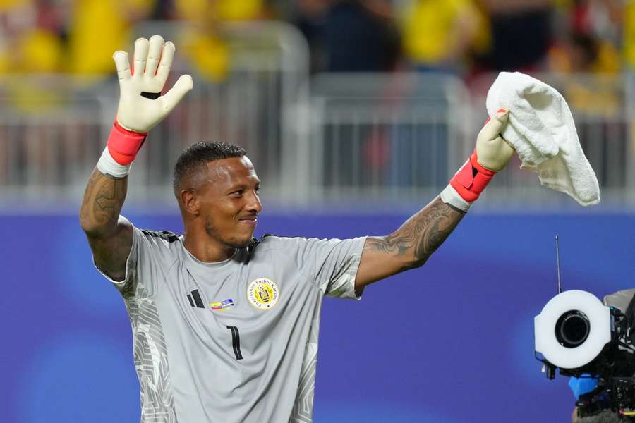 Curacao's Eloy Room waves to fans after Ecuador match at FIFA World Cup