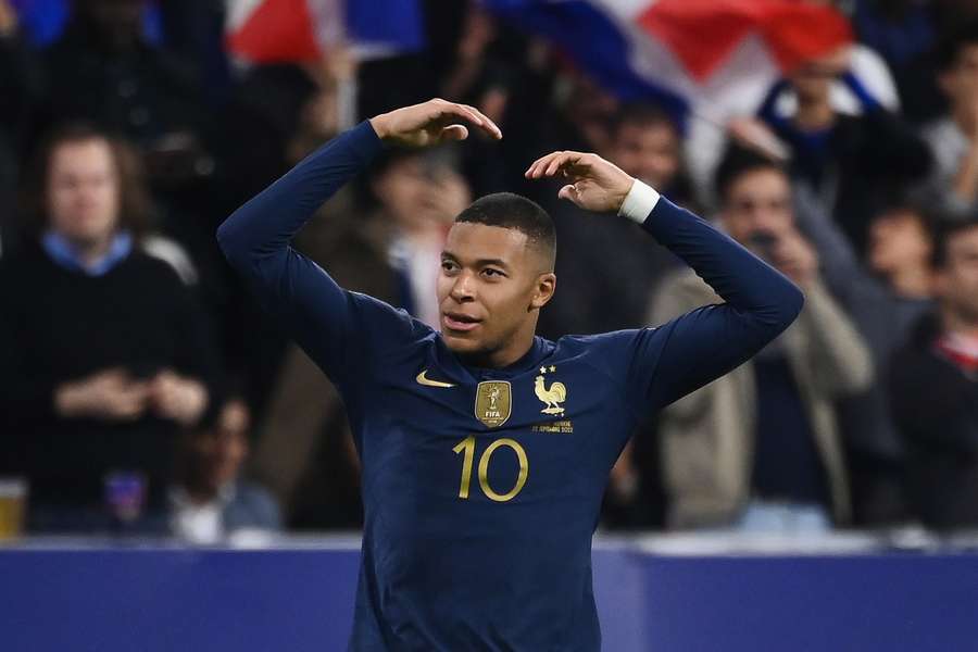 France's forward Kylian Mbappe celebrates after scoring during the UEFA Nations League match between France and Austria