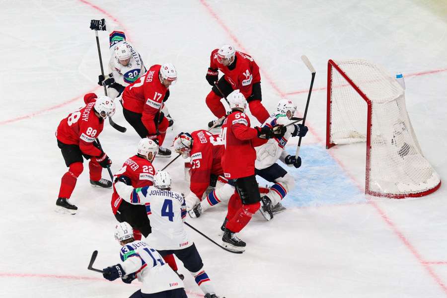 Chaos in front of the Swiss goal during the semi-final Chaos in front of the Swiss goal during the semi-final