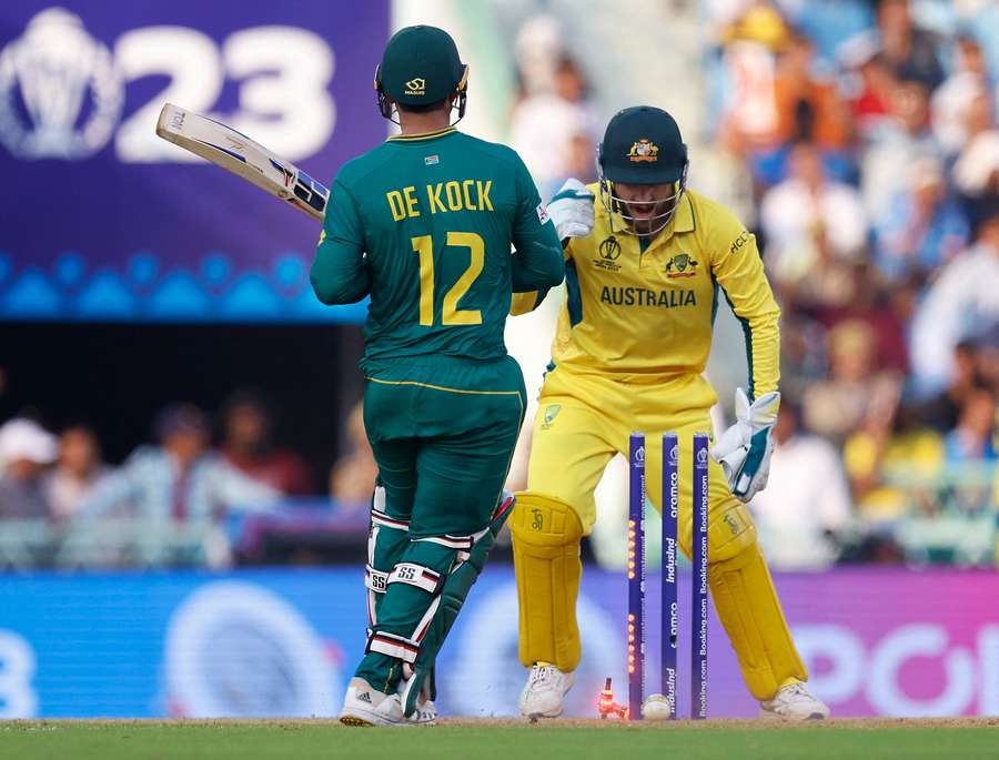 De Kock is bowled out by Australia's Glenn Maxwell