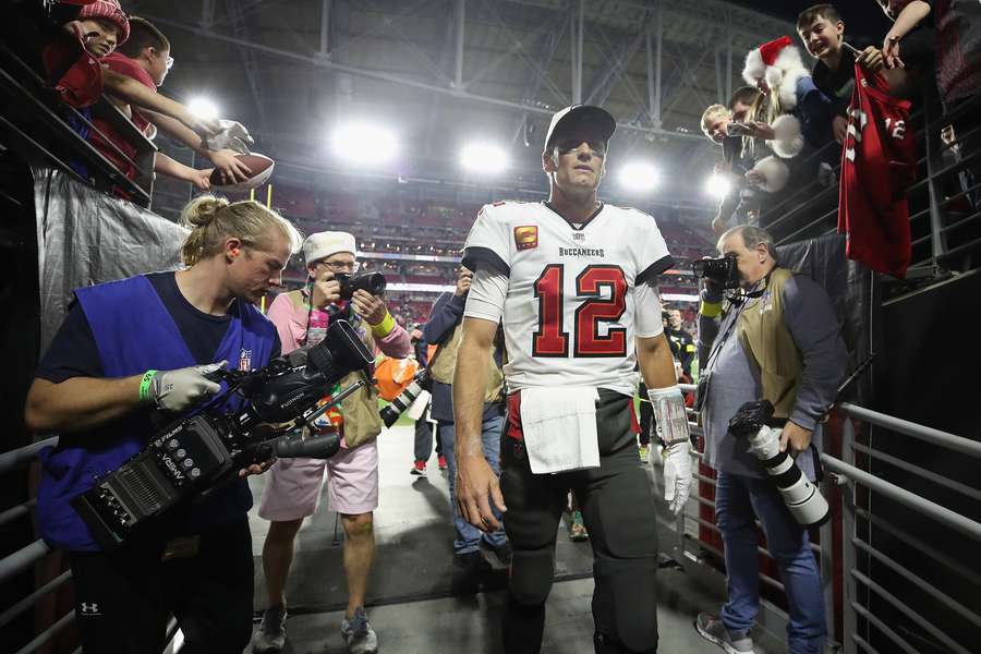 Tom Brady walks off the field during his time with the Tampa Bay Buccaneers