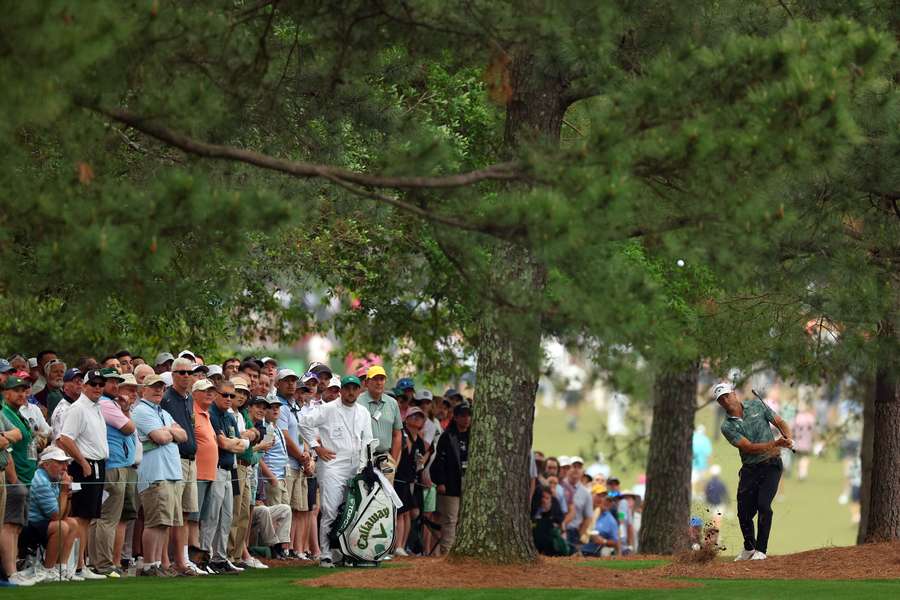 Alex Noren plays a shot on the first hole