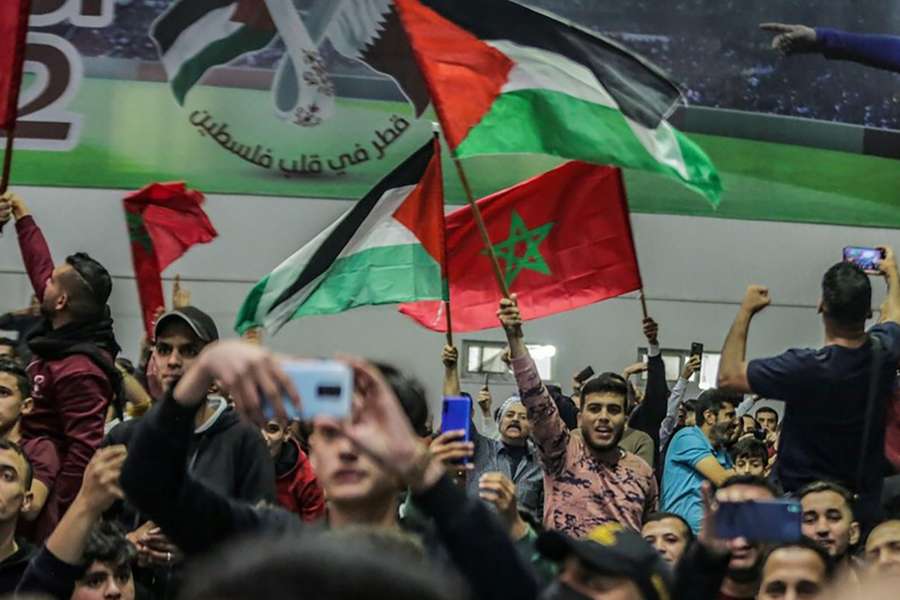 Palestinian flag flying with Moroccan fans