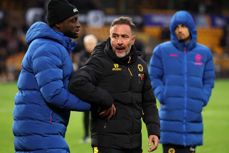 Vitor Pereira looks dejected after clashing with fans after Wolves' defeat to Burnley Vitor Pereira looks dejected after clashing with fans after Wolves' defeat to Burnley