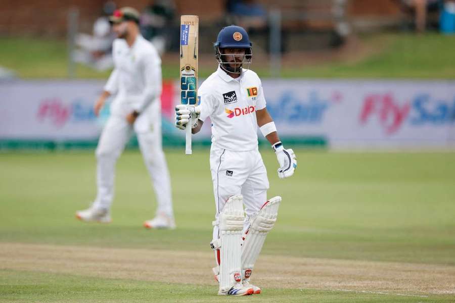 Pathum Nissanka celebrates after scoring a half-century during the second day of the second Test between South Africa and Sri Lanka