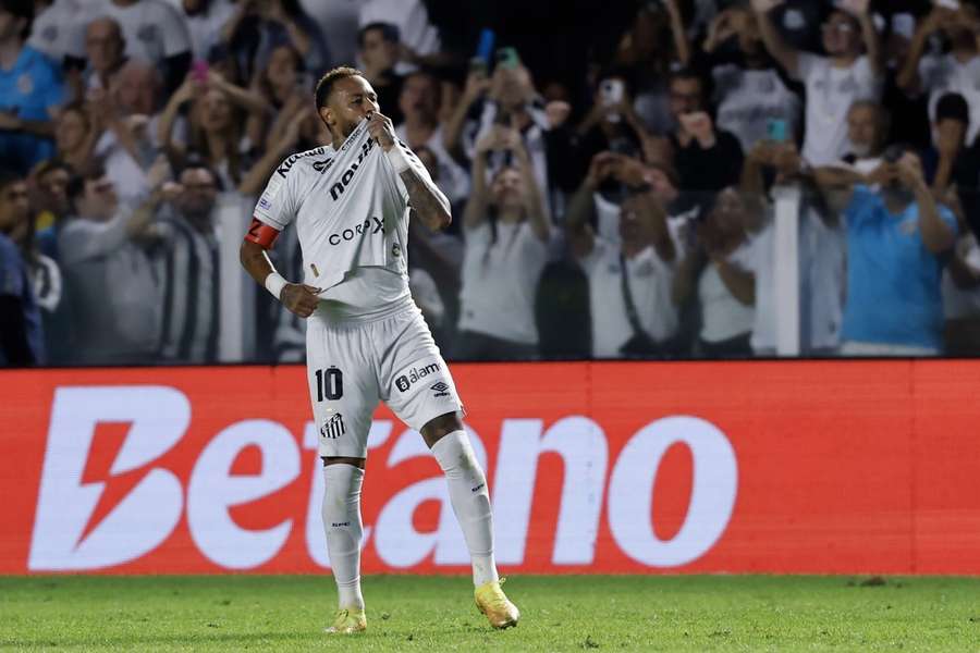 Neymar celebrates after scoring against Chapecoense in the Copa Sudamericana Neymar celebrates after scoring against Chapecoense in the Copa Sudamericana