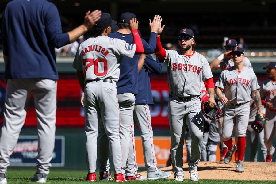 Boston Red Sox players celebrate the win against the Minnesota Twins