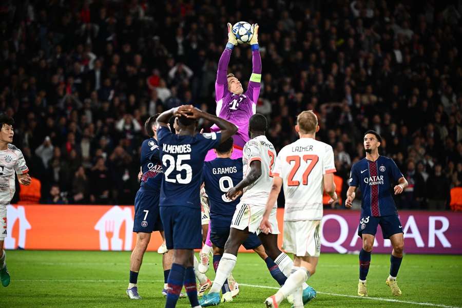 Bayern Munich's Manuel Neuer makes a save in the match vs PSG