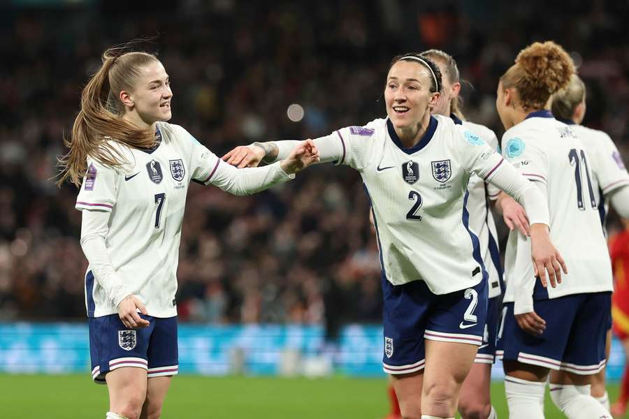 The England players celebrate Jessica Park's winning goal