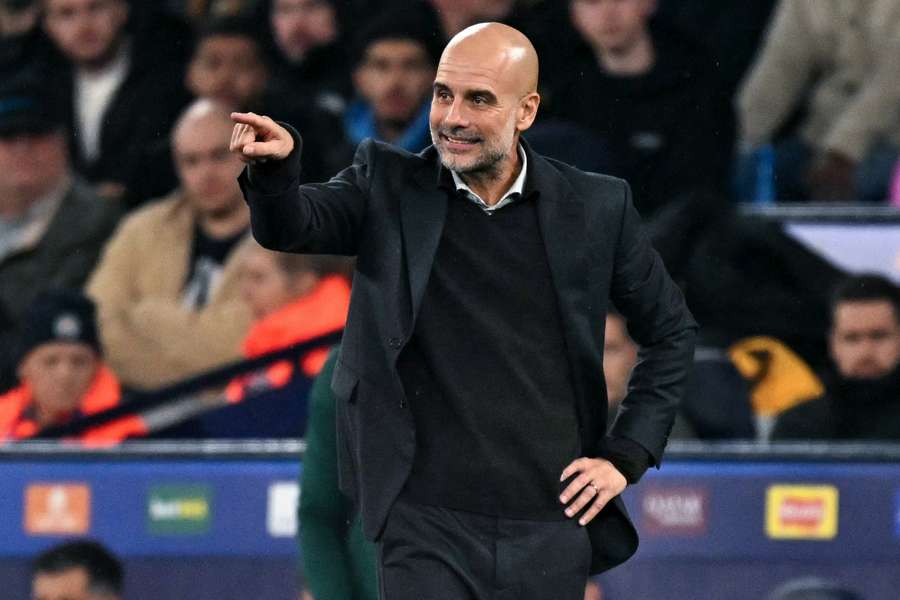 Pep Guardiola reacts during Man City's win over Dortmund Pep Guardiola reacts during Man City's win over Dortmund