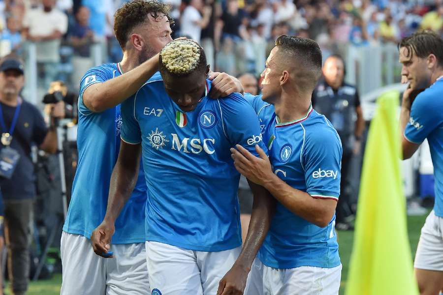 Napoli players celebrate with Osimhen