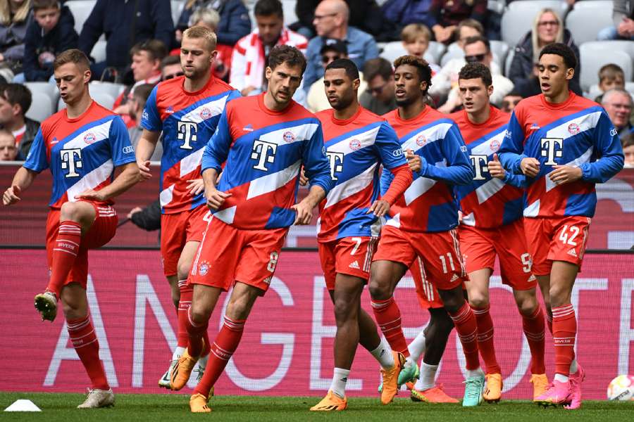Bayern Munich players during the warm up before their match with Hertha Berlin