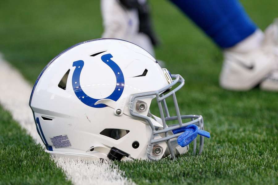 A Indianapolis Colts helmet sits not he field before the game against the Indianapolis Colts and the Cincinnati Bengals