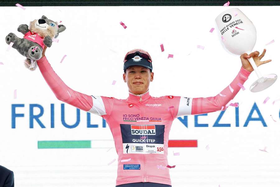 Paul Magnier in the pink jersey after winning stage one