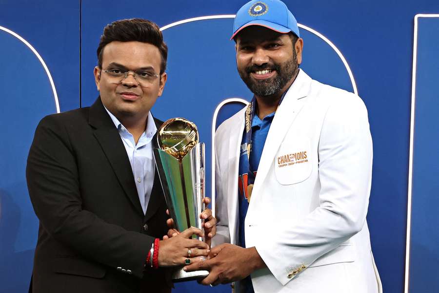 India's Rohit being handed the trophy