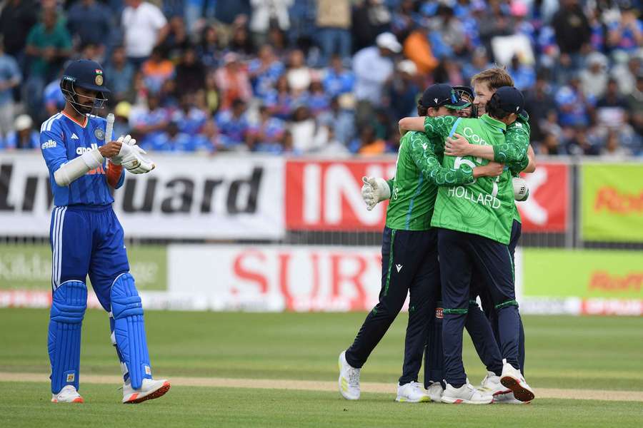 Ireland players celebrate victory over India in their second T20