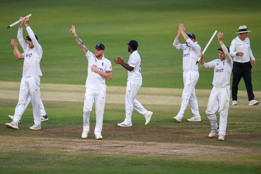 England's players celebrate their win